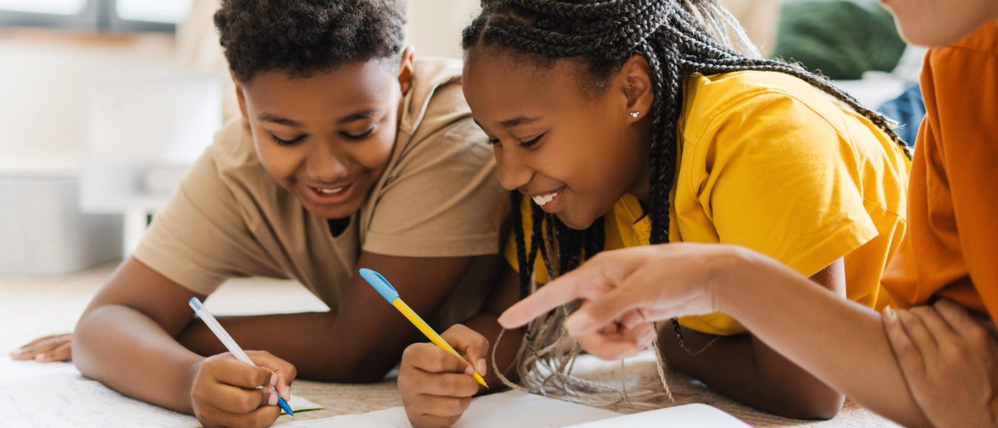 cheerful-woman-and-kids-drawing-at-home-at-the-car-2025-02-20-10-28-51-utc-min
